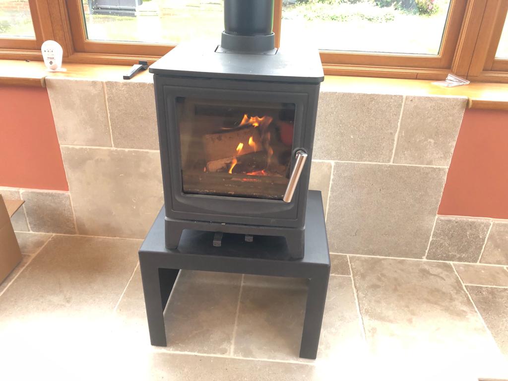 log burner with briquettes